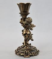 Մոմակալ հրեշտակով (ձախ) գույն․ բրոնզ